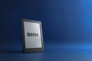 E-book reading concept with detail of e-book on blue background